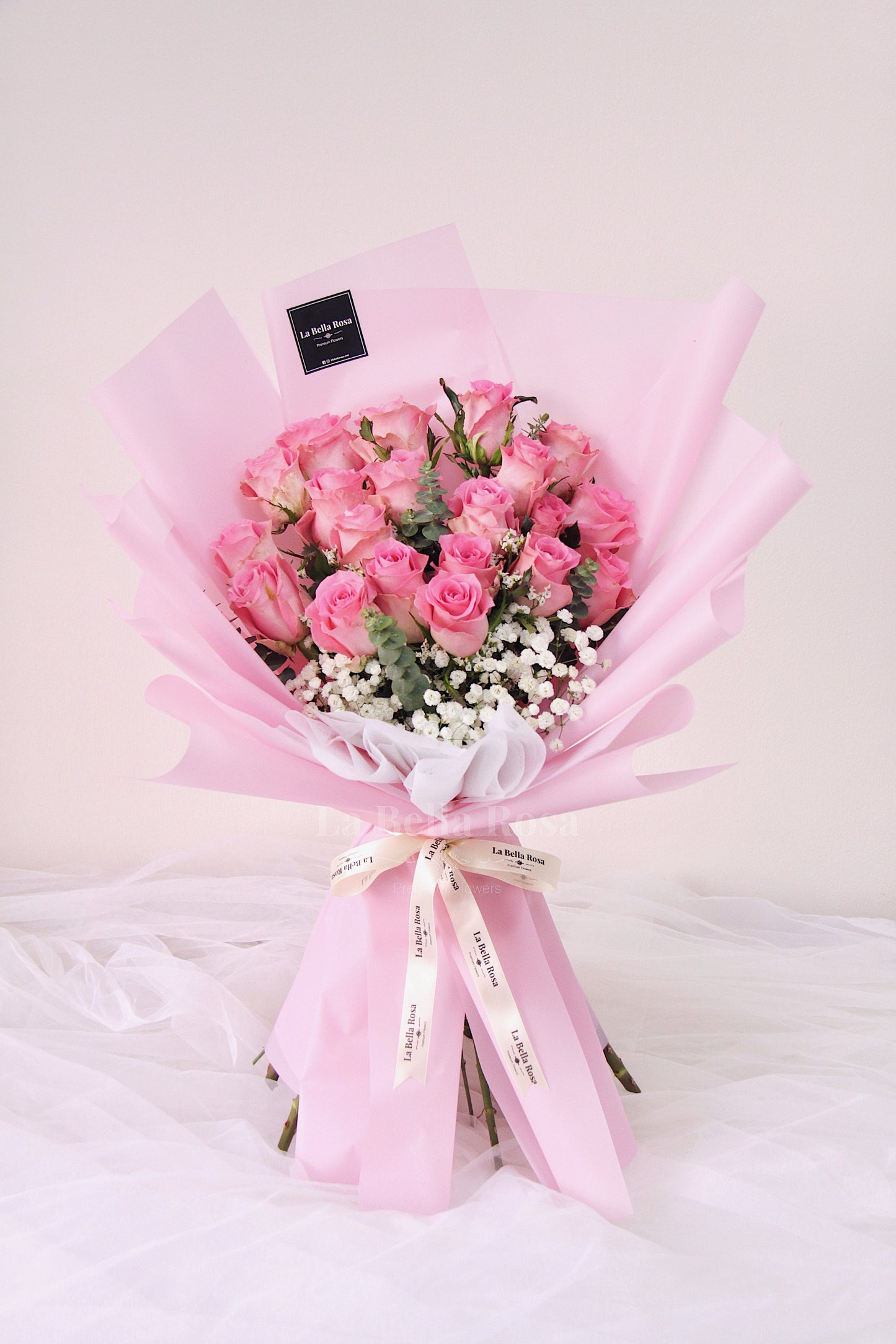 Pastel pink rose and baby's breath bouquet by Bella Rosa Gardens